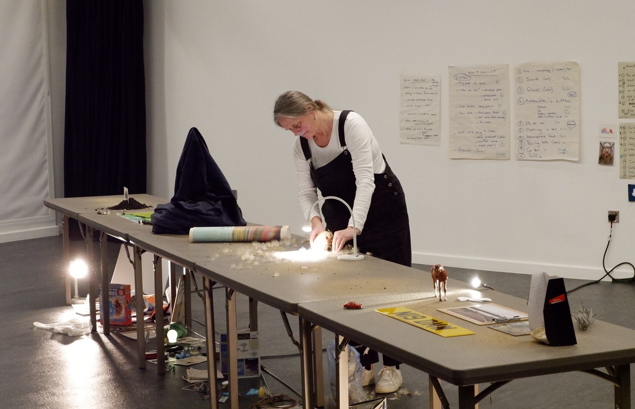 Artist working on art pieces